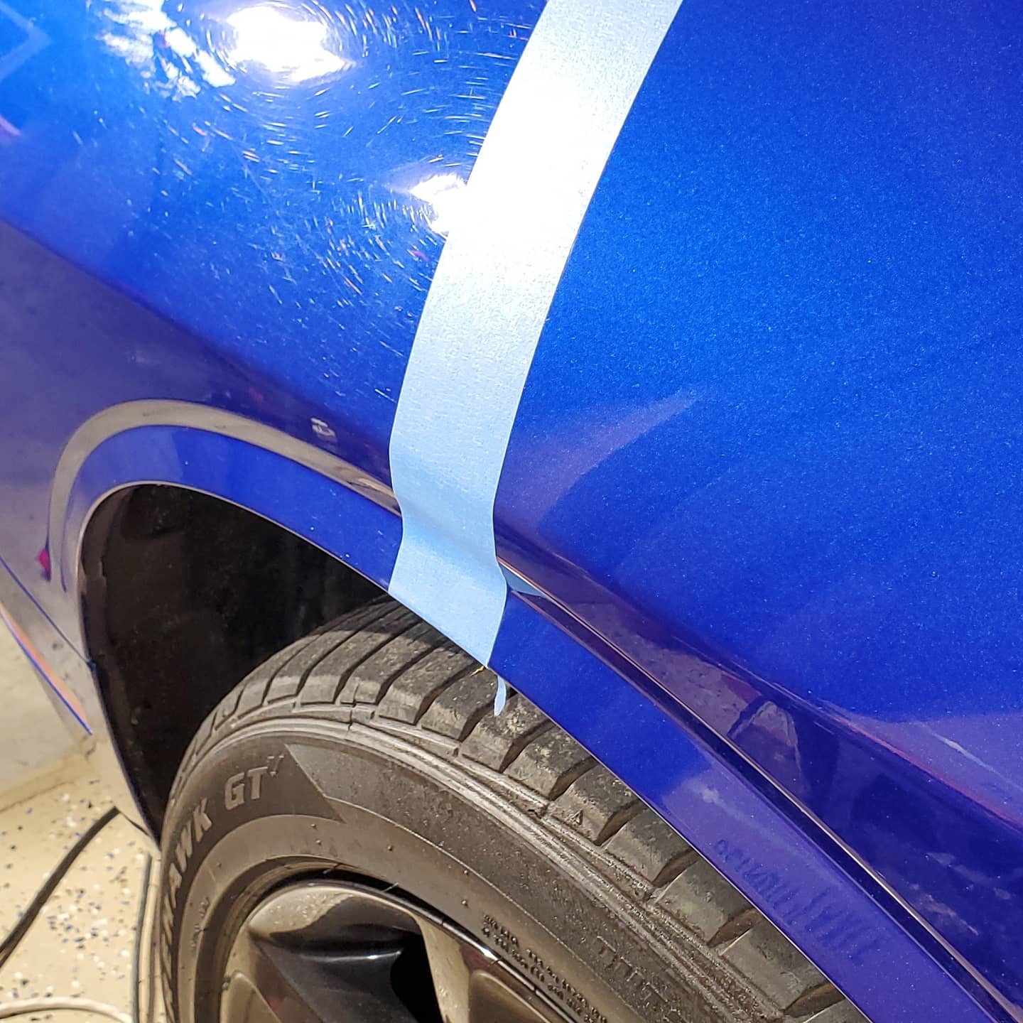 blue-car-paint-correction-close-up